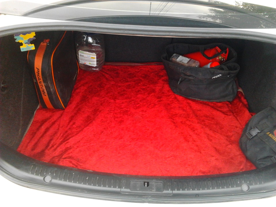 Порядок в багажнике — Mazda 3 (1G) BK
