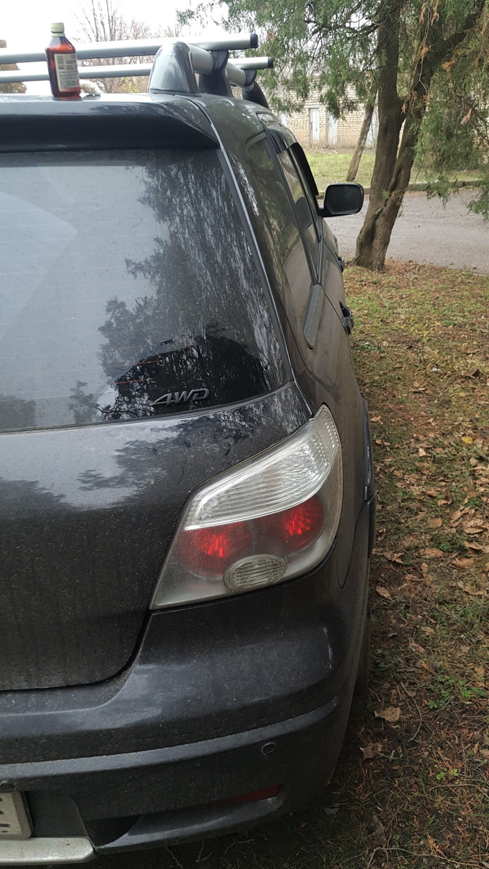 Неприметно и там где надо) — Mitsubishi Outlander (1G)