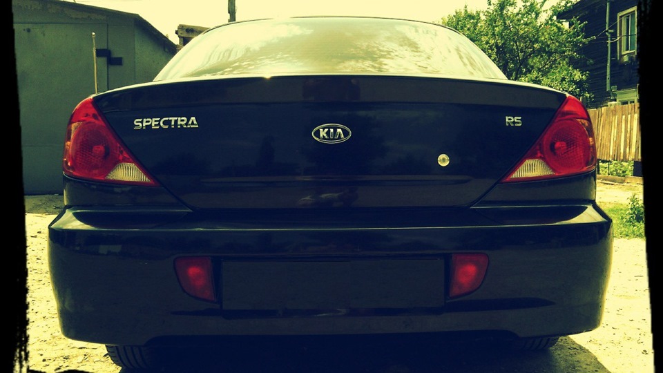 KIA Spectra **черный огонь**
