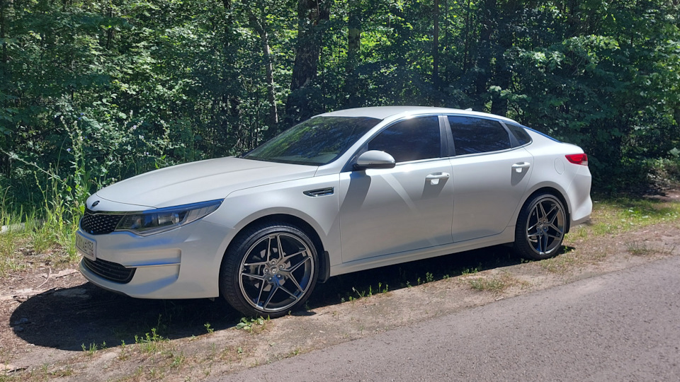 KIA Optima Белый перламутр 2.0 6МТ