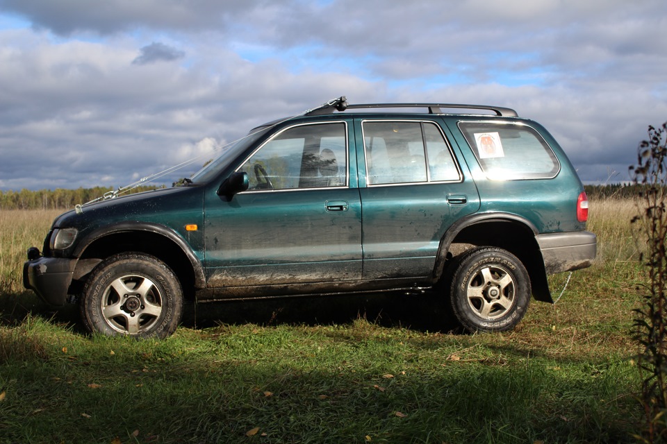 Фото в бортжурнале KIA Sportage (1G)