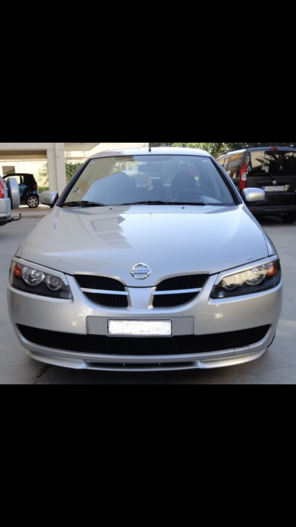 2 — Nissan Almera II (N16)