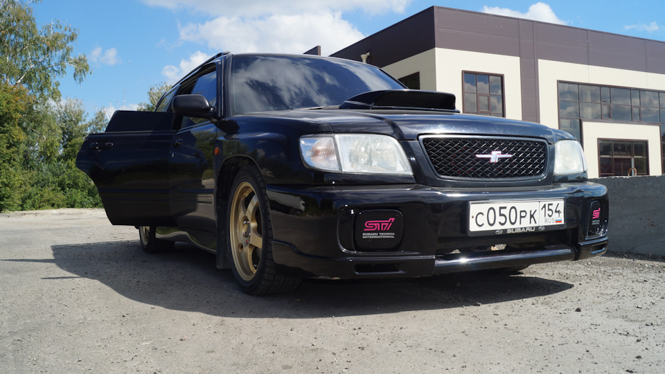 Subaru Forester Черный Кот