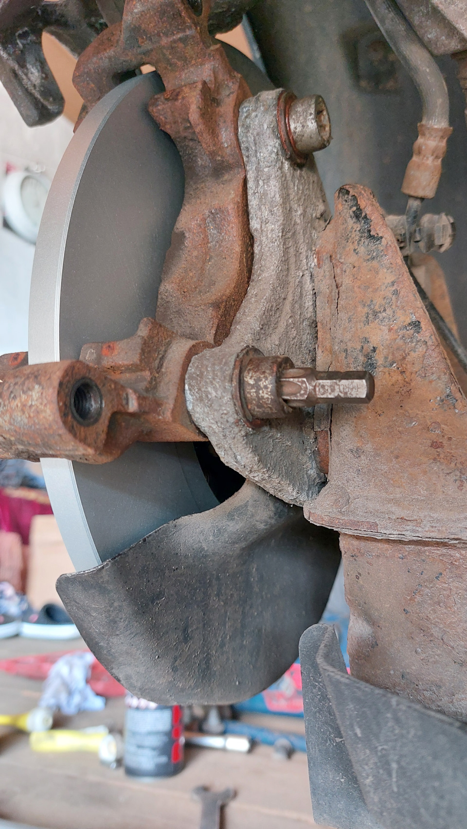 Откручиваем скобу torx T55 — Peugeot 308 SW (2G)