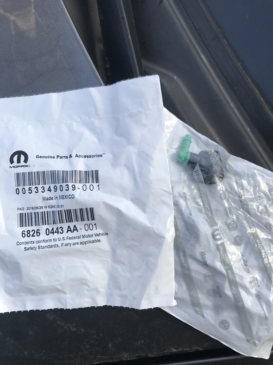 Фото в бортжурнале Jeep Grand Cherokee (WK). Запчасти на фото: 68260443AA