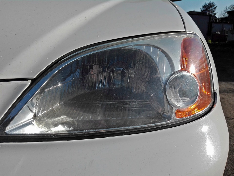 левая фара до полировки — Honda Civic Ferio (7G)