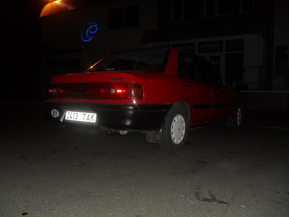 попа)) — Mazda 323 IV