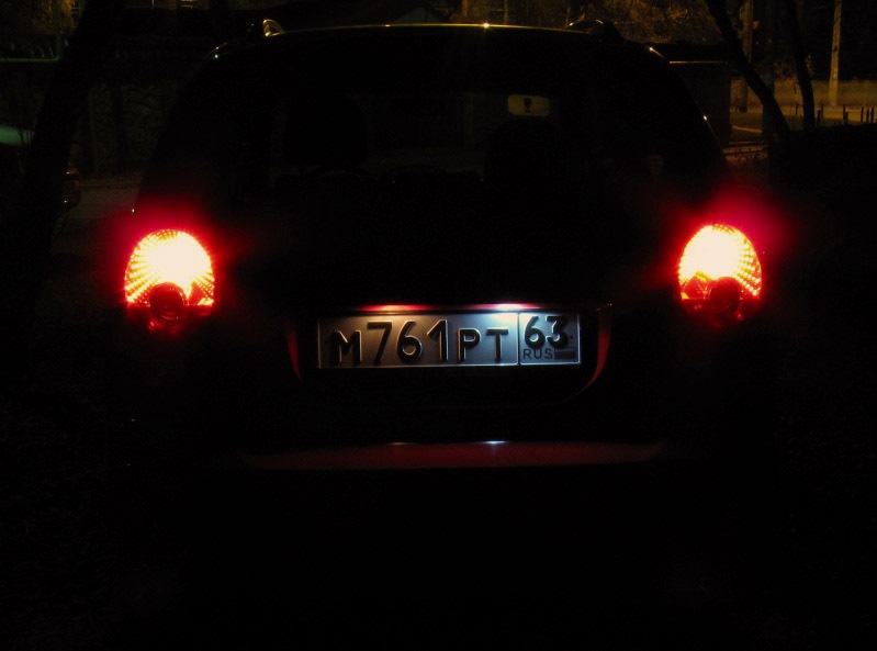 Подсветка номера, справа штатная лампа — Chevrolet Spark (M200/M250)