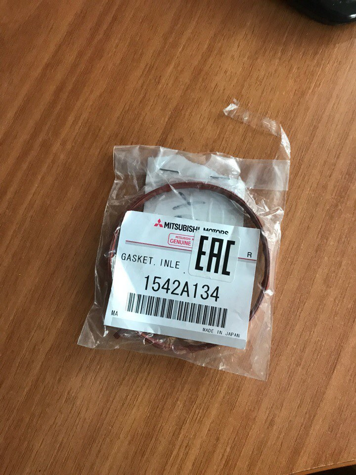 Прокладка дроссельной заслонки: GASKET INLE 1542A134 — Mitsubishi Lancer X. Запчасти на фото: 1542A134
