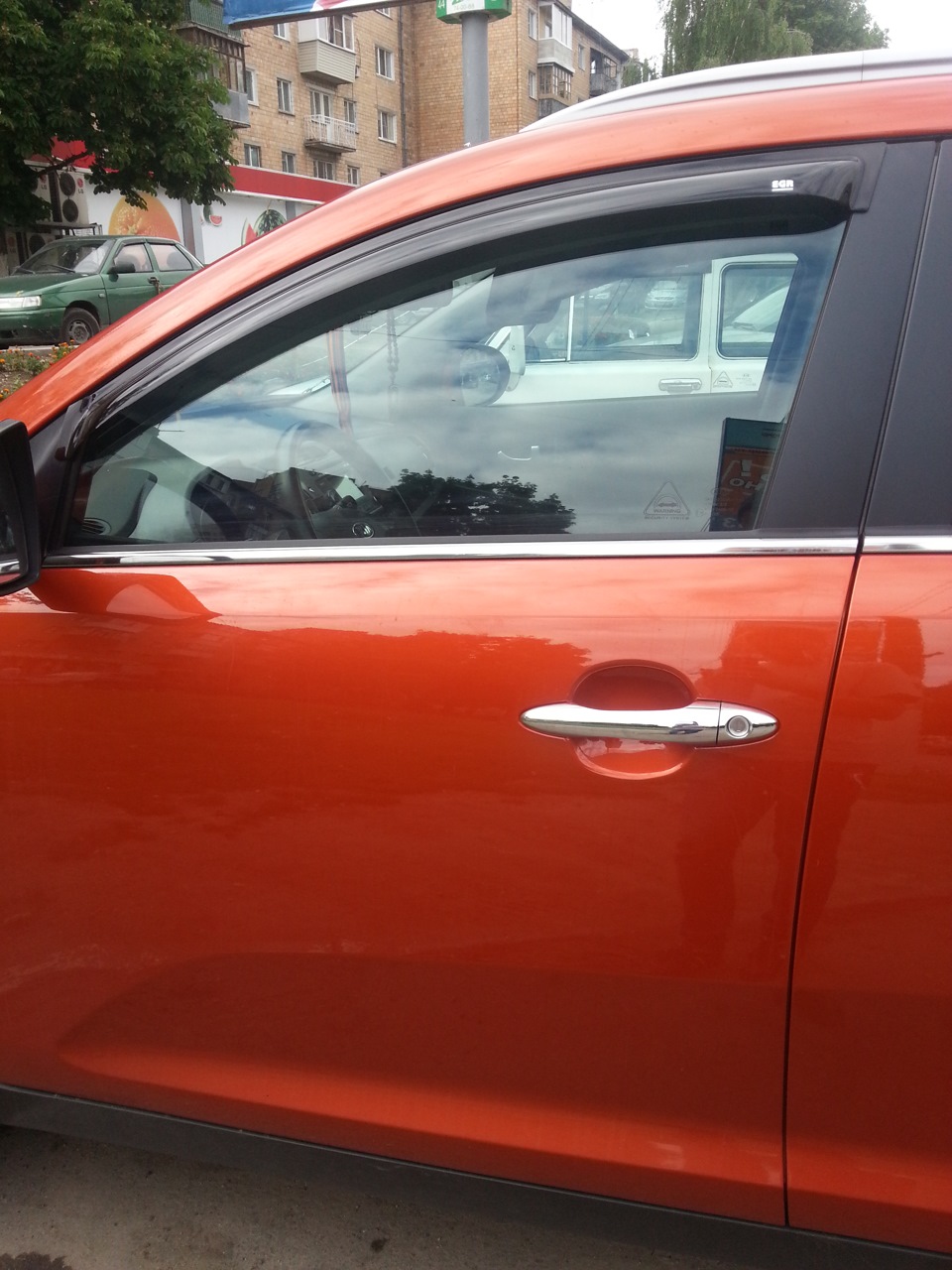 С пленкой — KIA Sportage (3G)