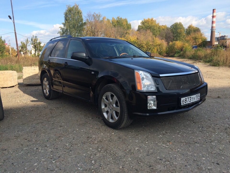 тачка-огонь, я еще не знаю сколько раз по столько в нее залью — Cadillac SRX (1G)