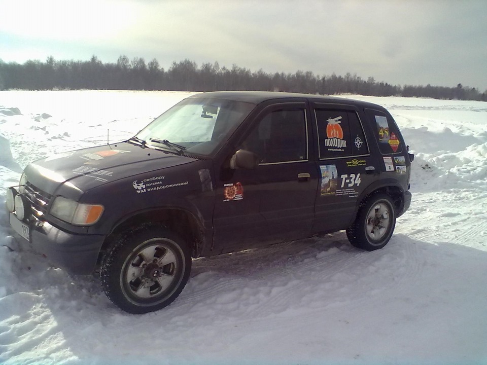 2011 — KIA Sportage (1G)