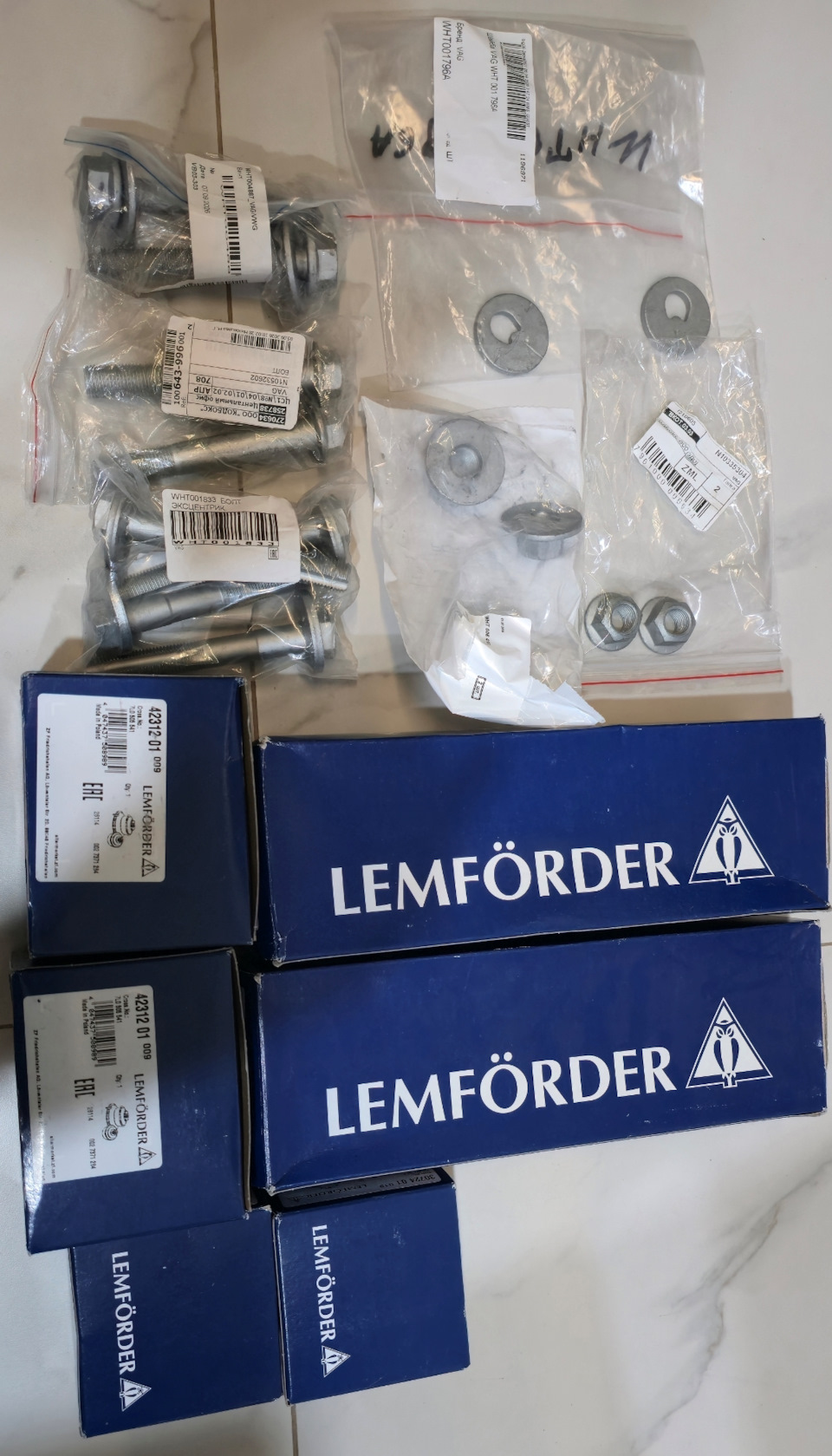 Фото в бортжурнале Volkswagen Touareg (2G). Запчасти на фото: WHT004887, N10335304, 4231201